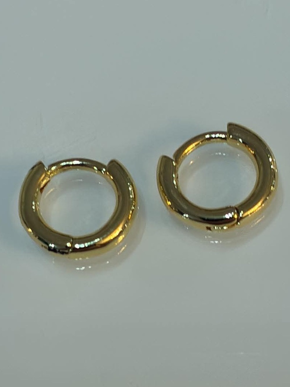 Sterling silver
Gold Huggie Hoop Earrings - Classic Everyday Style